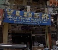 logo of Arora Sewing Machine Co